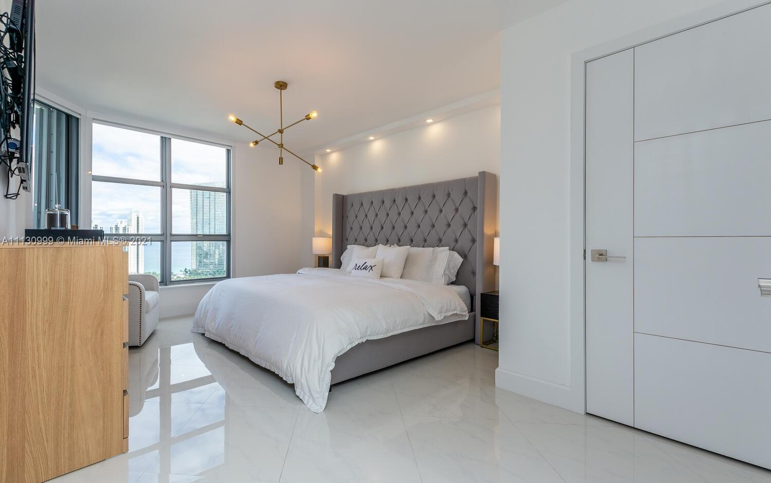 Professionally staged master bedroom in Miami Beach