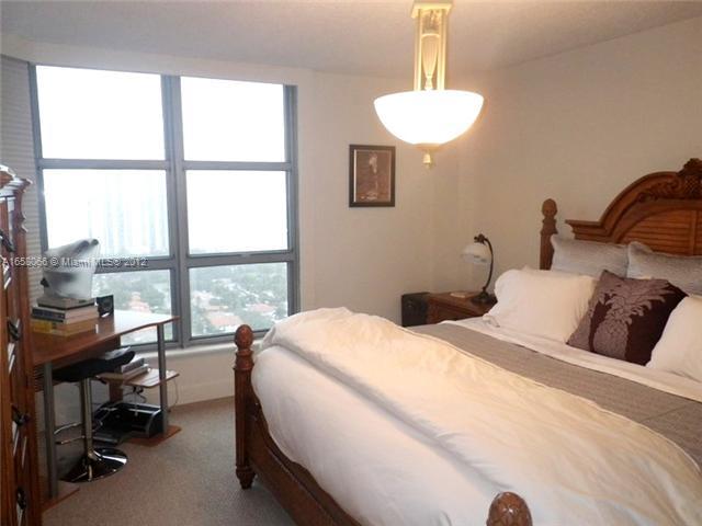 Unstaged master bedroom in Miami Beach