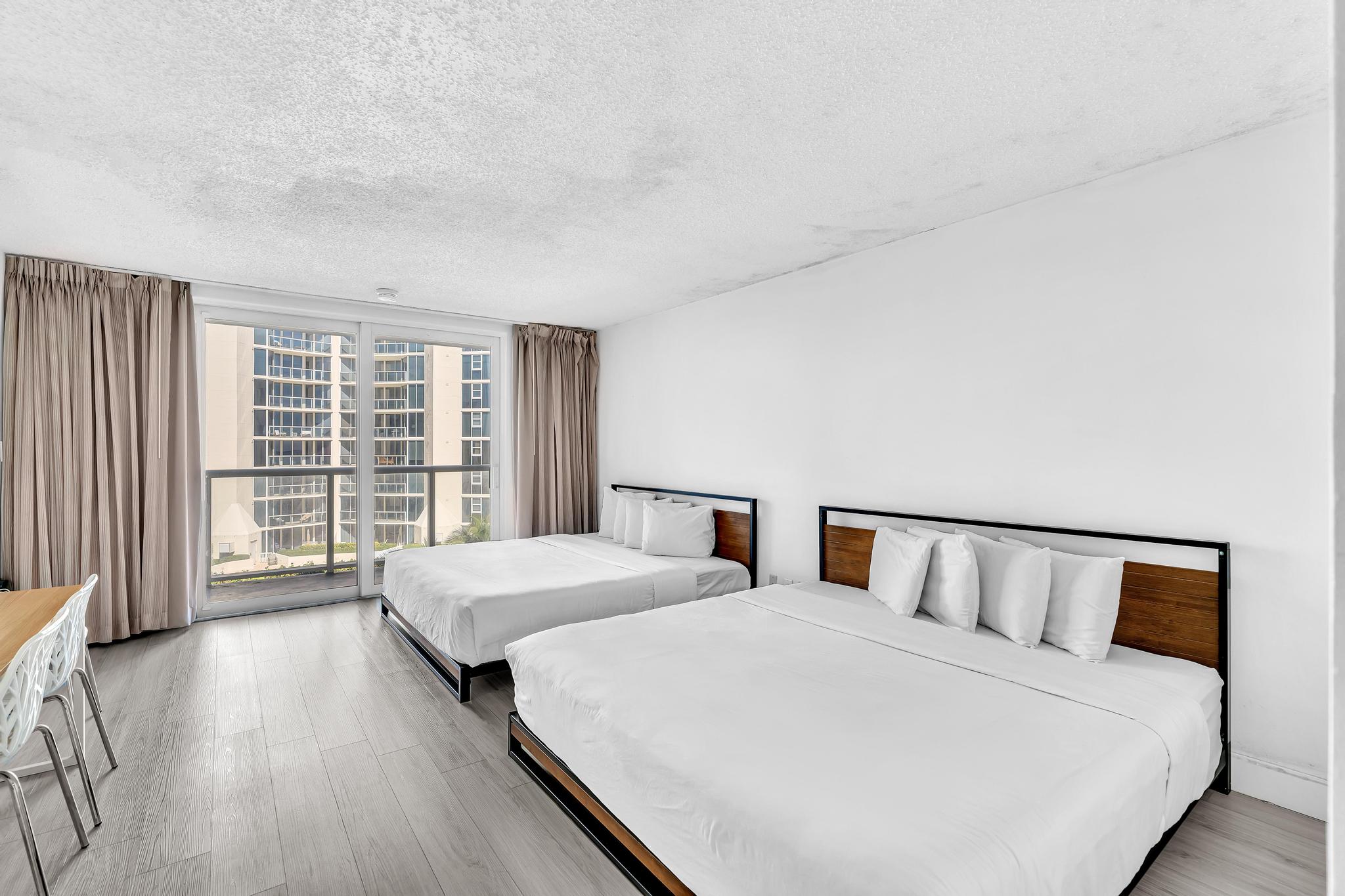 Studio Retreat with Balcony and Partial Ocean View- 424