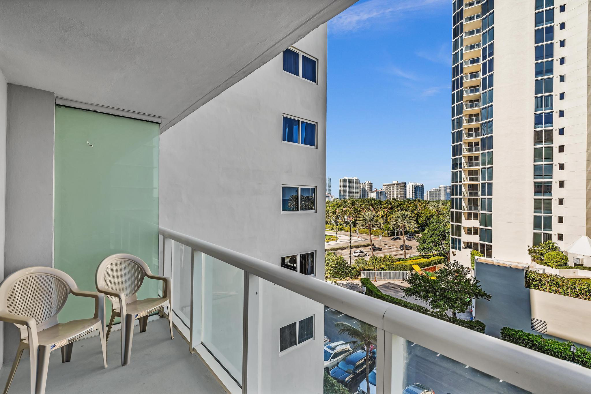 Studio Retreat with Balcony and Partial Ocean View- 424