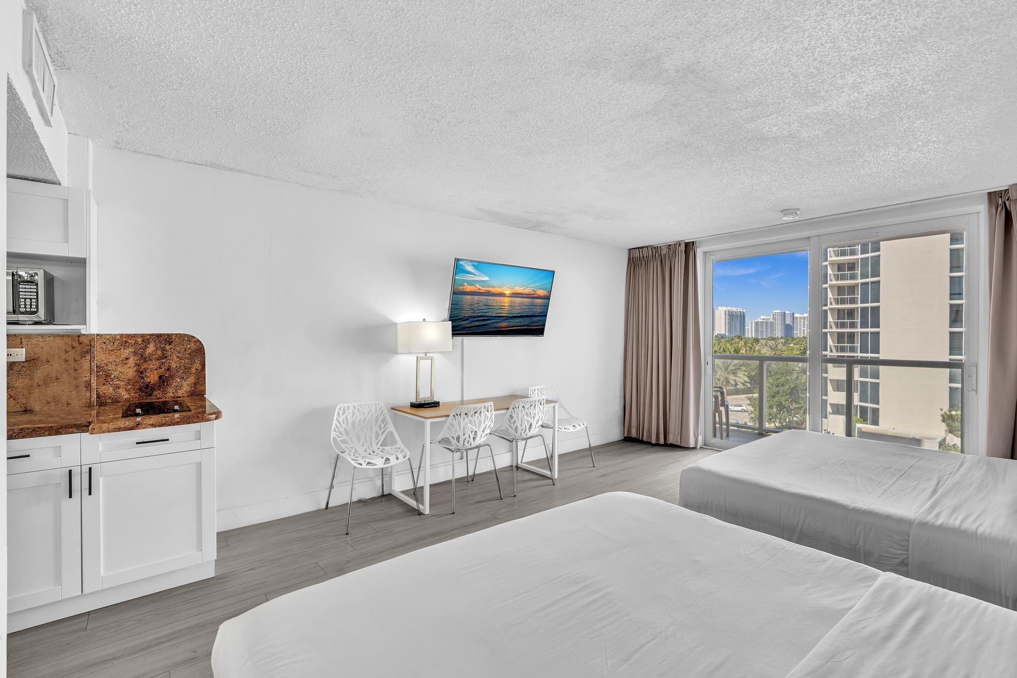 Studio Retreat with Balcony and Partial Ocean View- 424